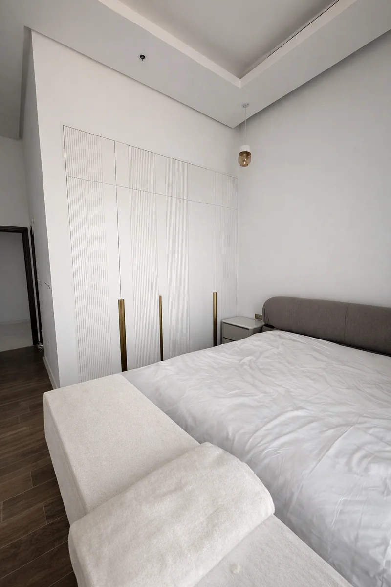 Luxury master suite interior design at Noora Tower Dubai – Creative Avenue bespoke bedroom fit-out