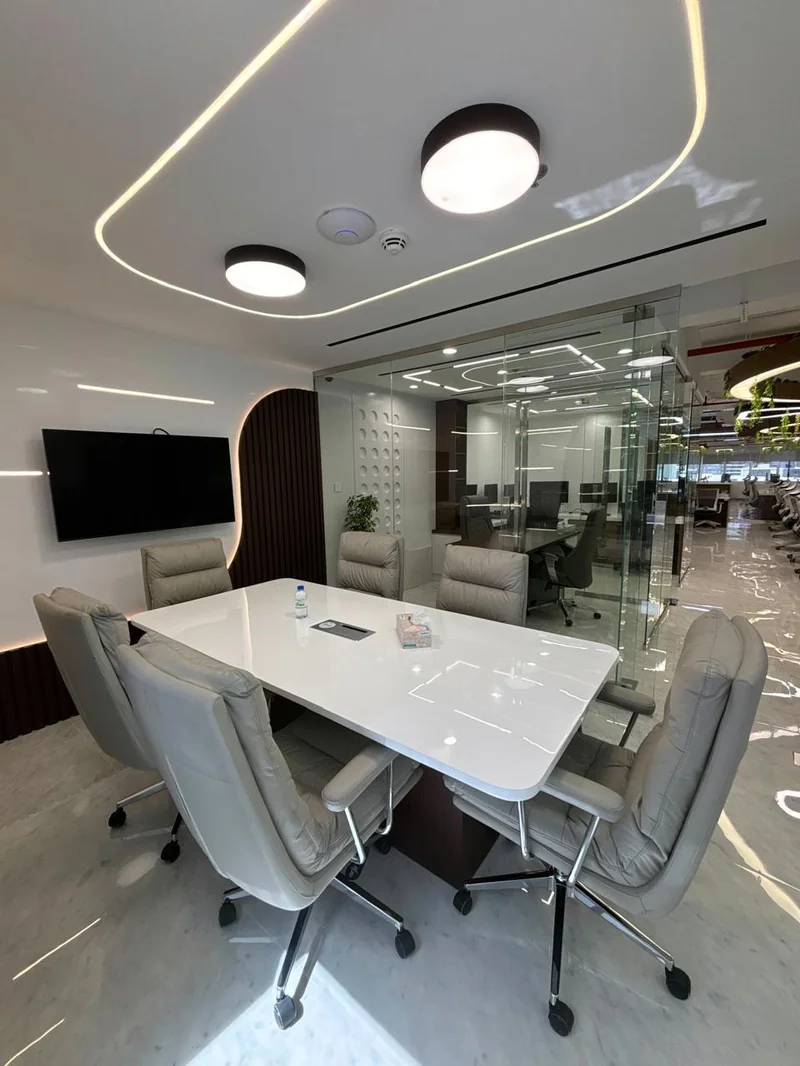 Custom meeting room joinery and conference table – Shriji Trading DMCC office fit-out JLT Dubai UAE
