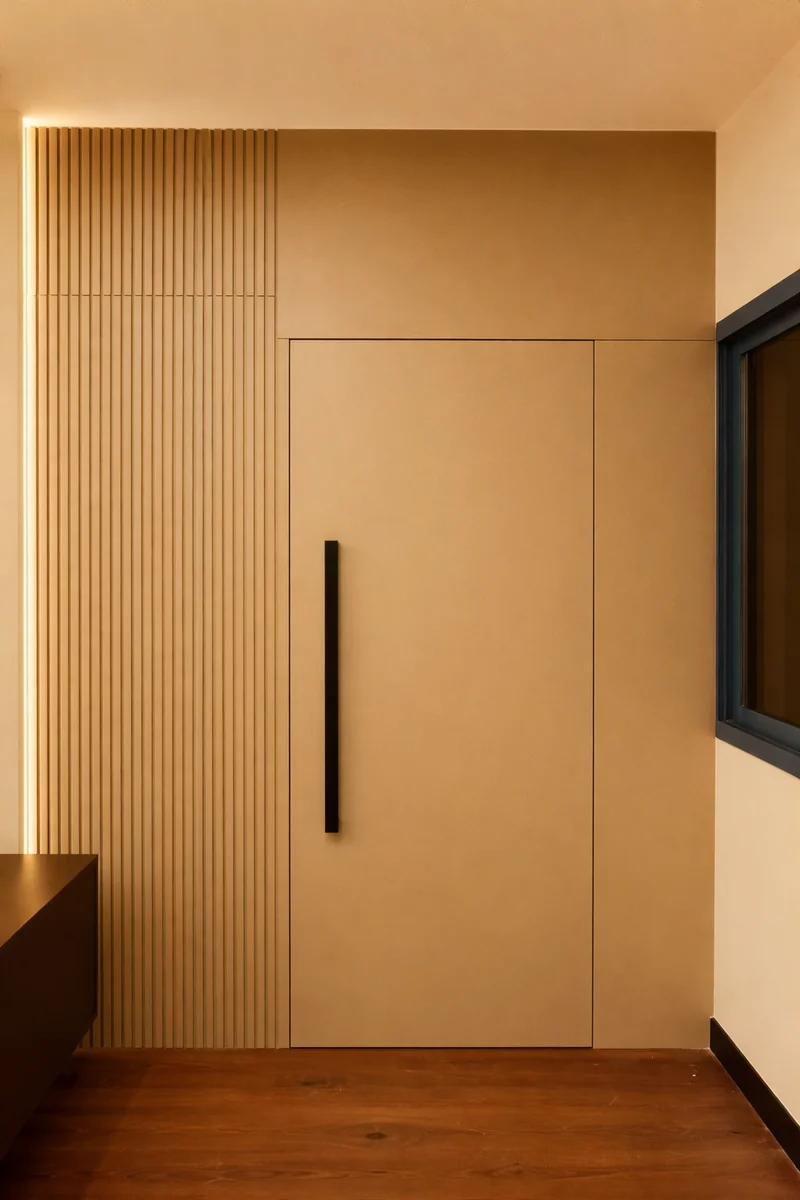 Bespoke hidden door design seamlessly integrated into wall – Creative Avenue custom furniture Dubai